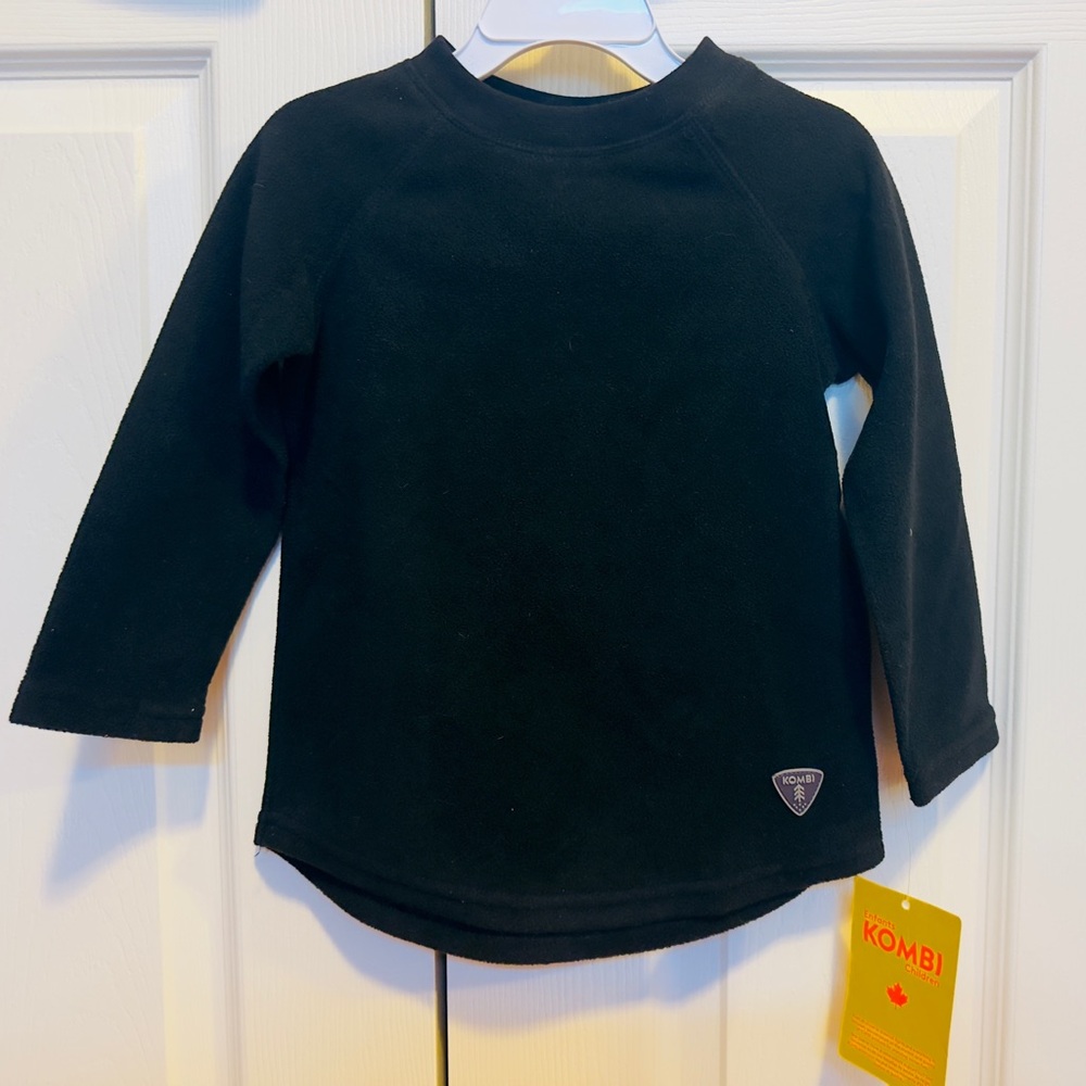 Brand new Kombi base layer fleece top kids size S (4T)